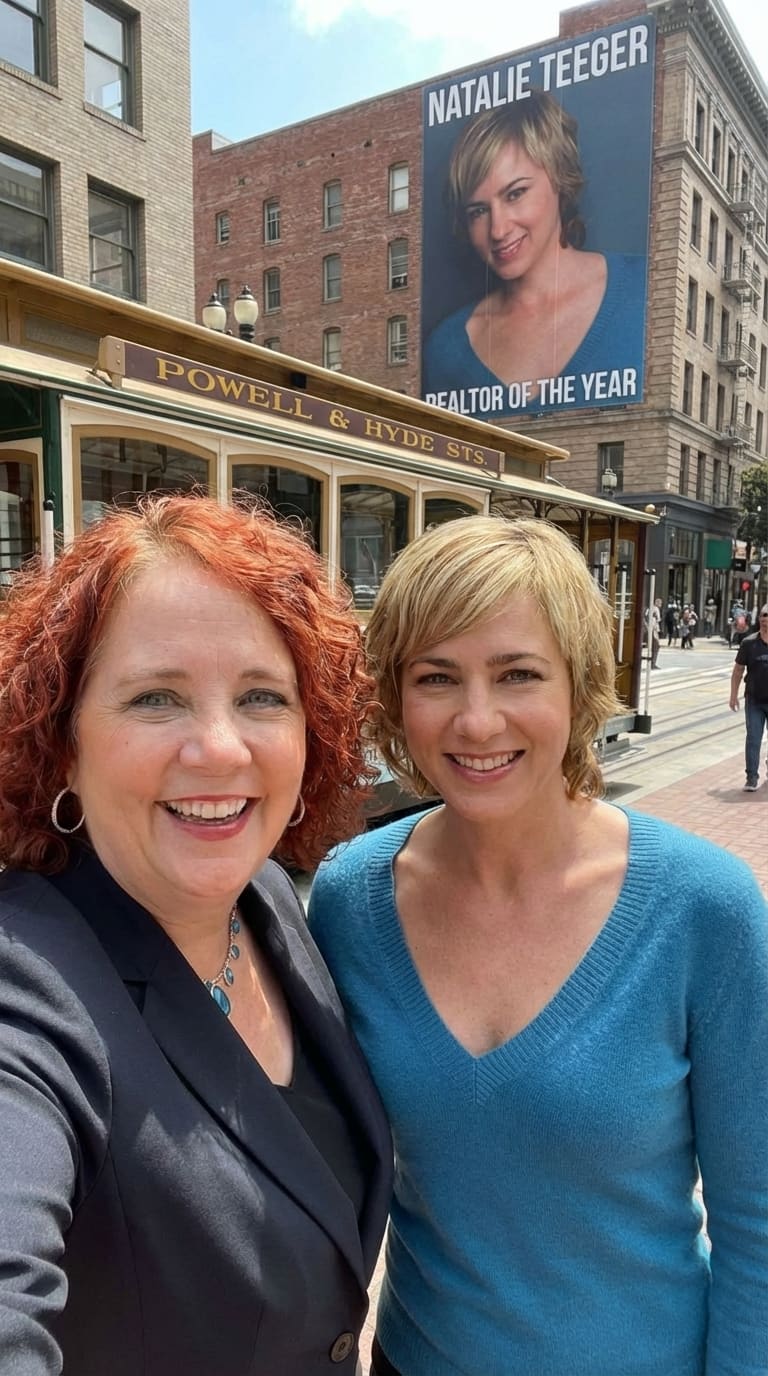 Mariquita with Natalie Teeger in front of a Realtor of the Year billboard (AI)